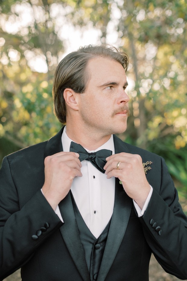 groom in classic tuxedo