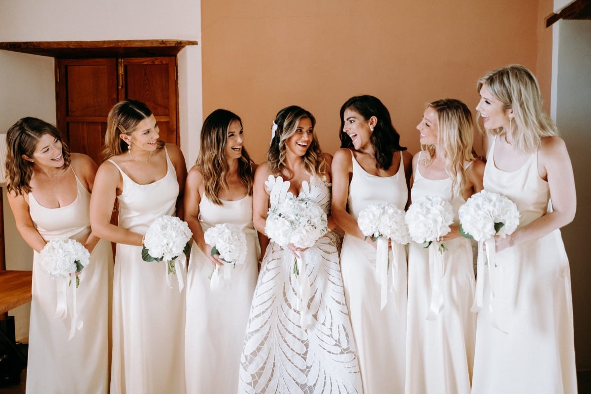 white bridesmaid dresses with hydrangea bouquets