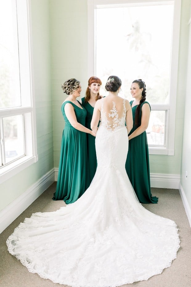 bridesmaids in emerald dresses