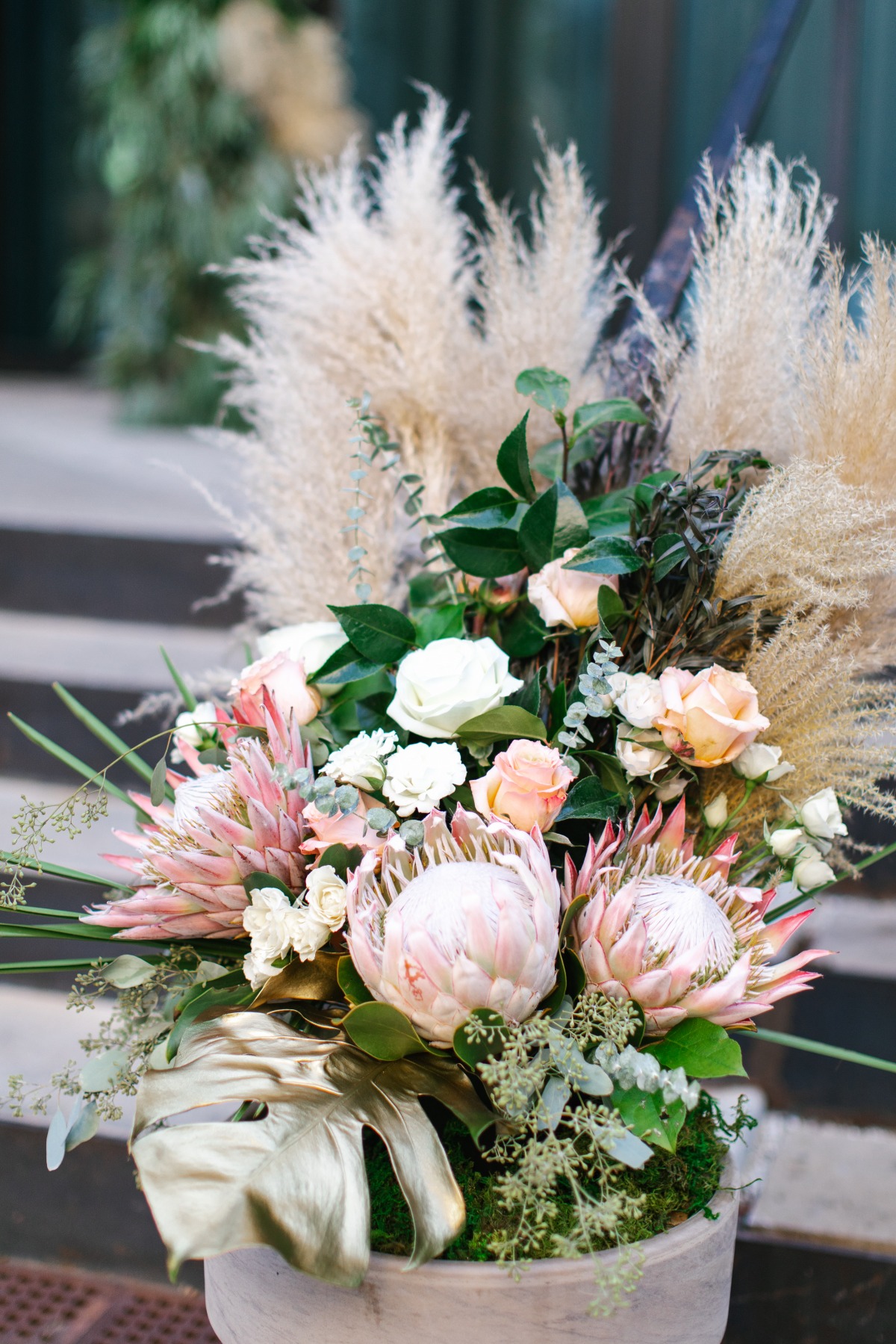 protea and papas grass arrangement