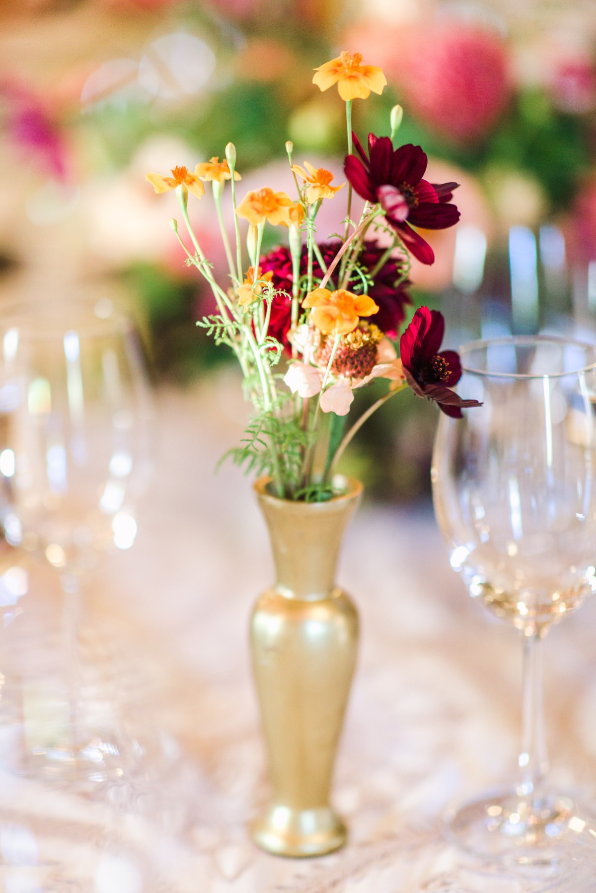 gold vase at floral arrangement