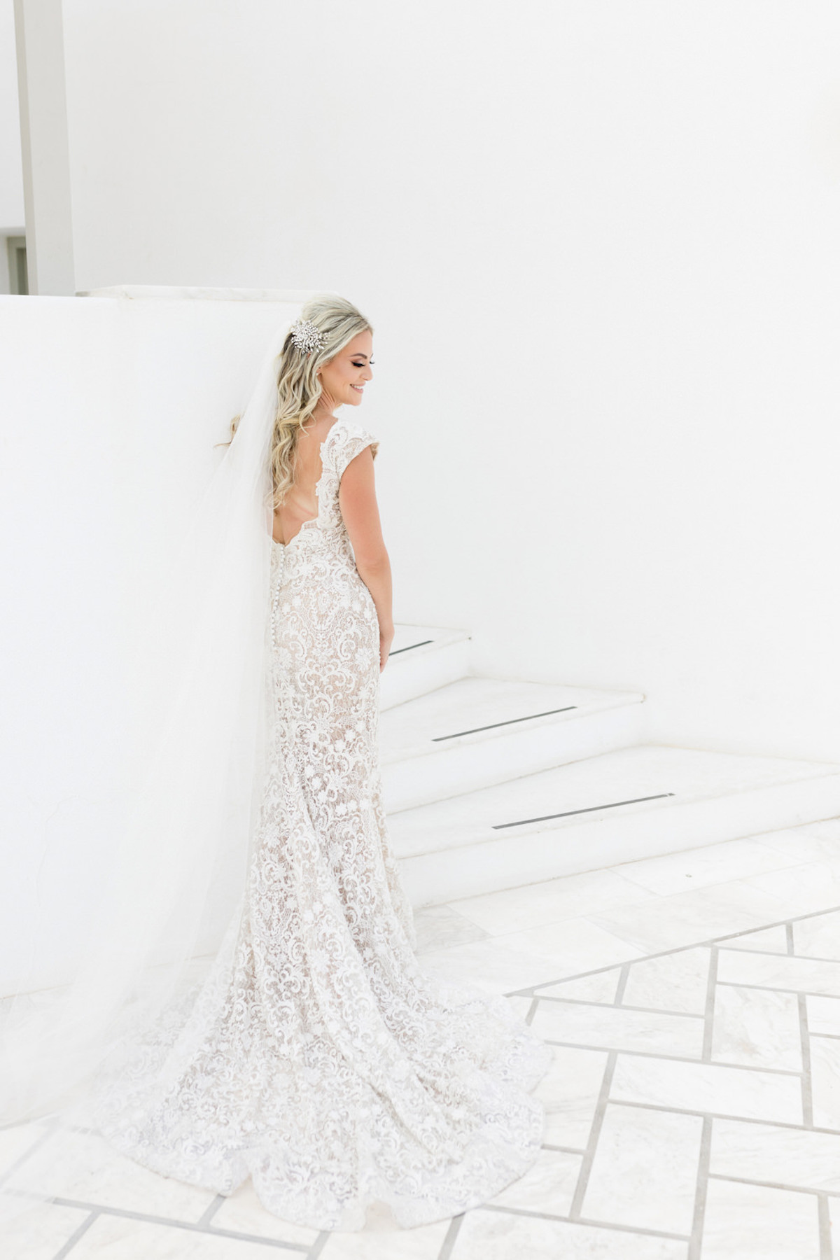 long lace wedding dress with keyhole back by Berta