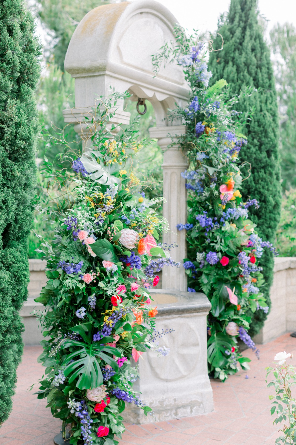 rainbow arch wedding backdrop by Tyler Speier Events