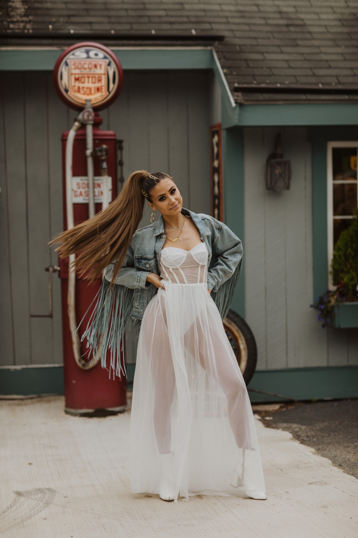 Bride wearing The Borrowed & Blue Project  fringe jean jacket