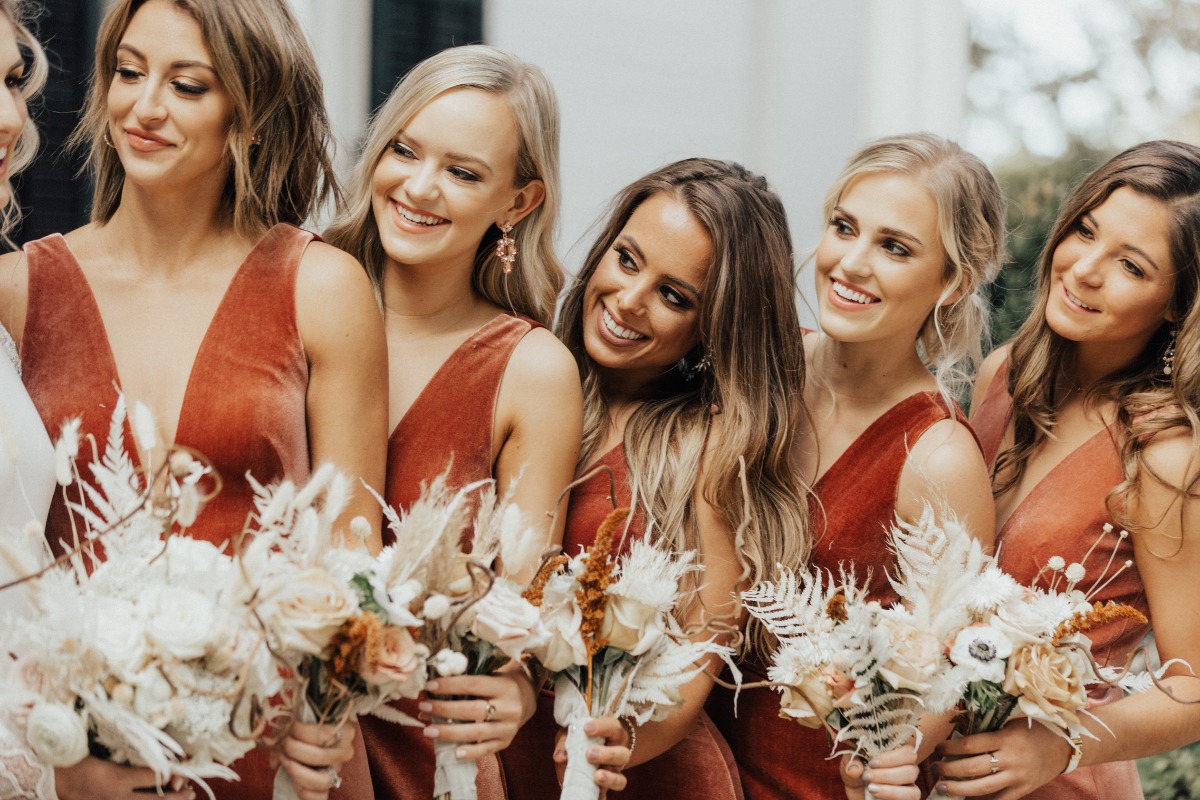 terra cotta bridesmaid dress with dried floral wedding bouquet