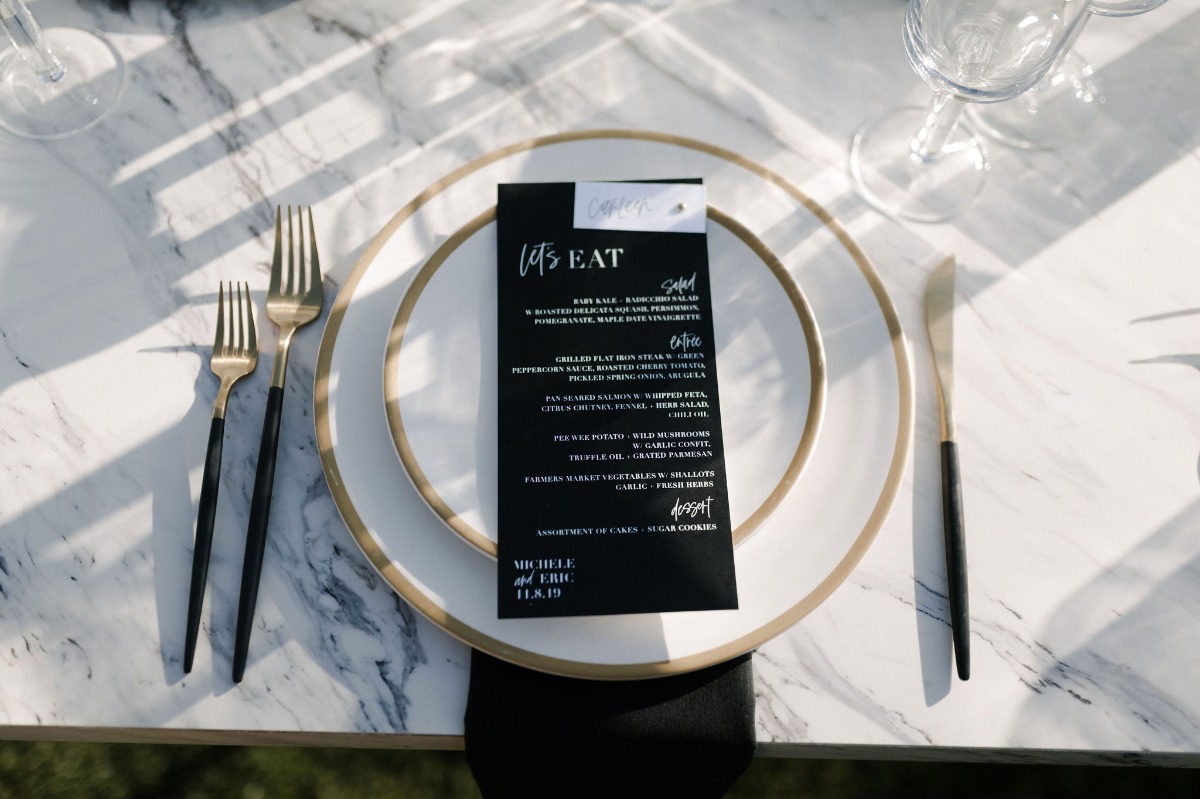 black wedding menu with white lighting