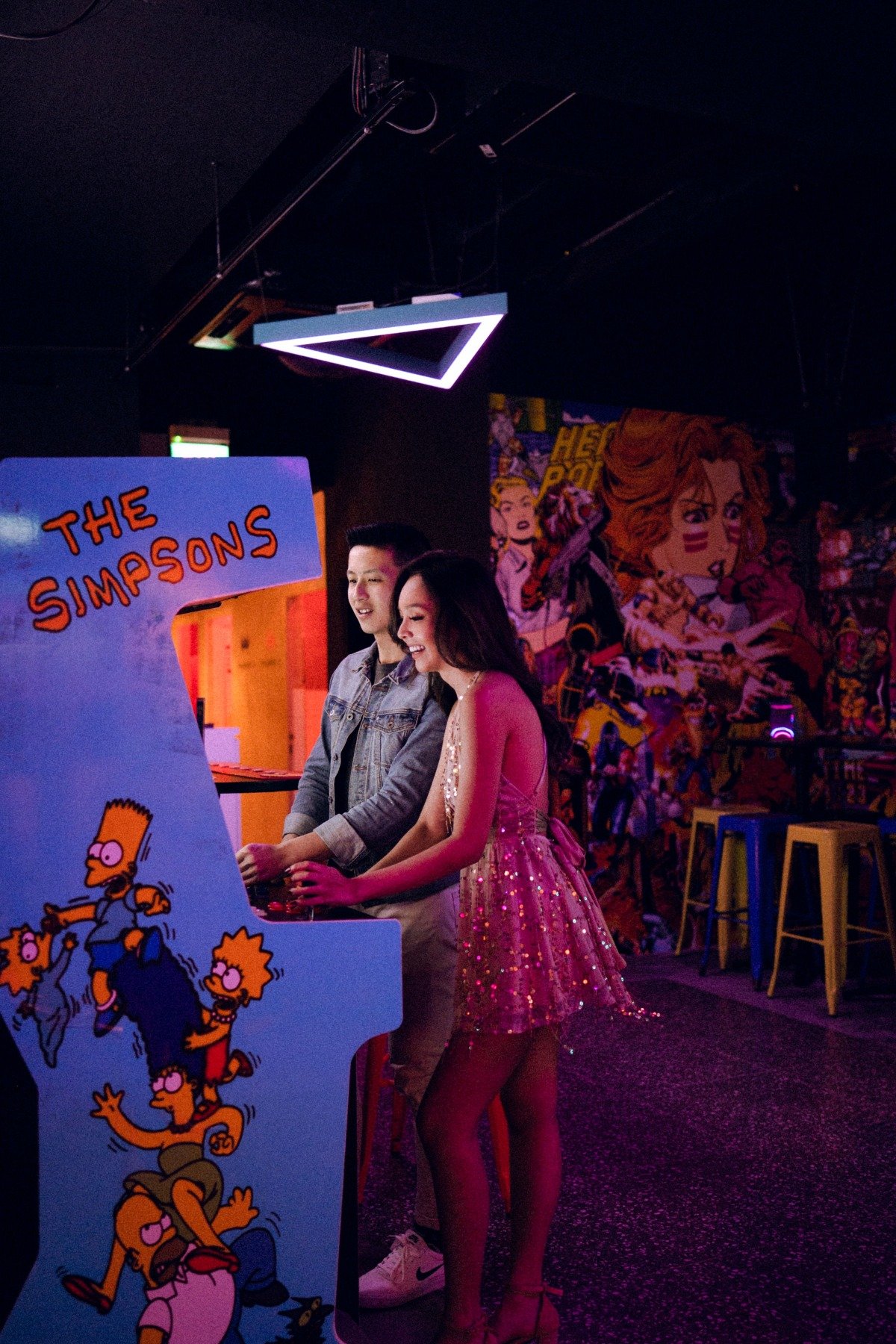 Disco Themed Engagement Shoot At A Neon Arcade