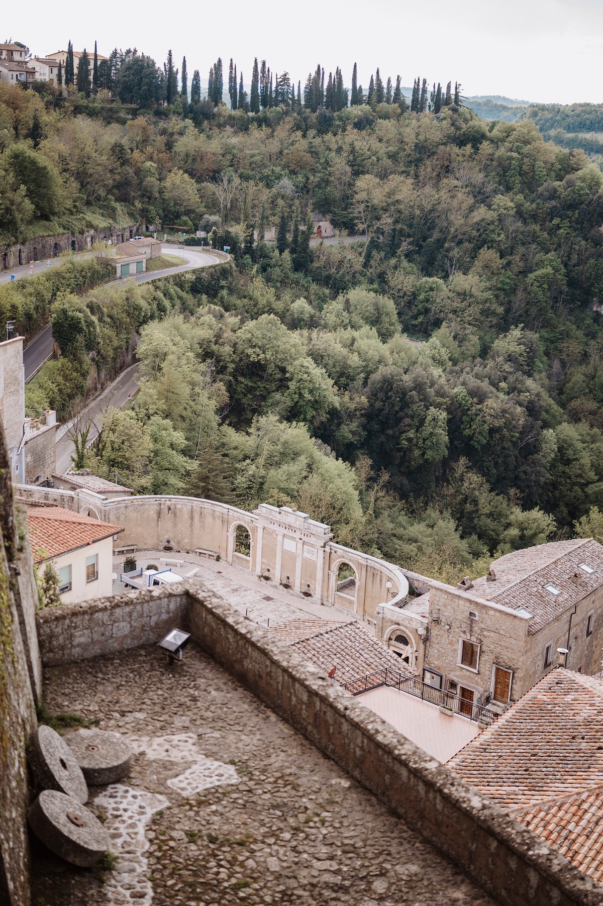 View over rooftops into mountains