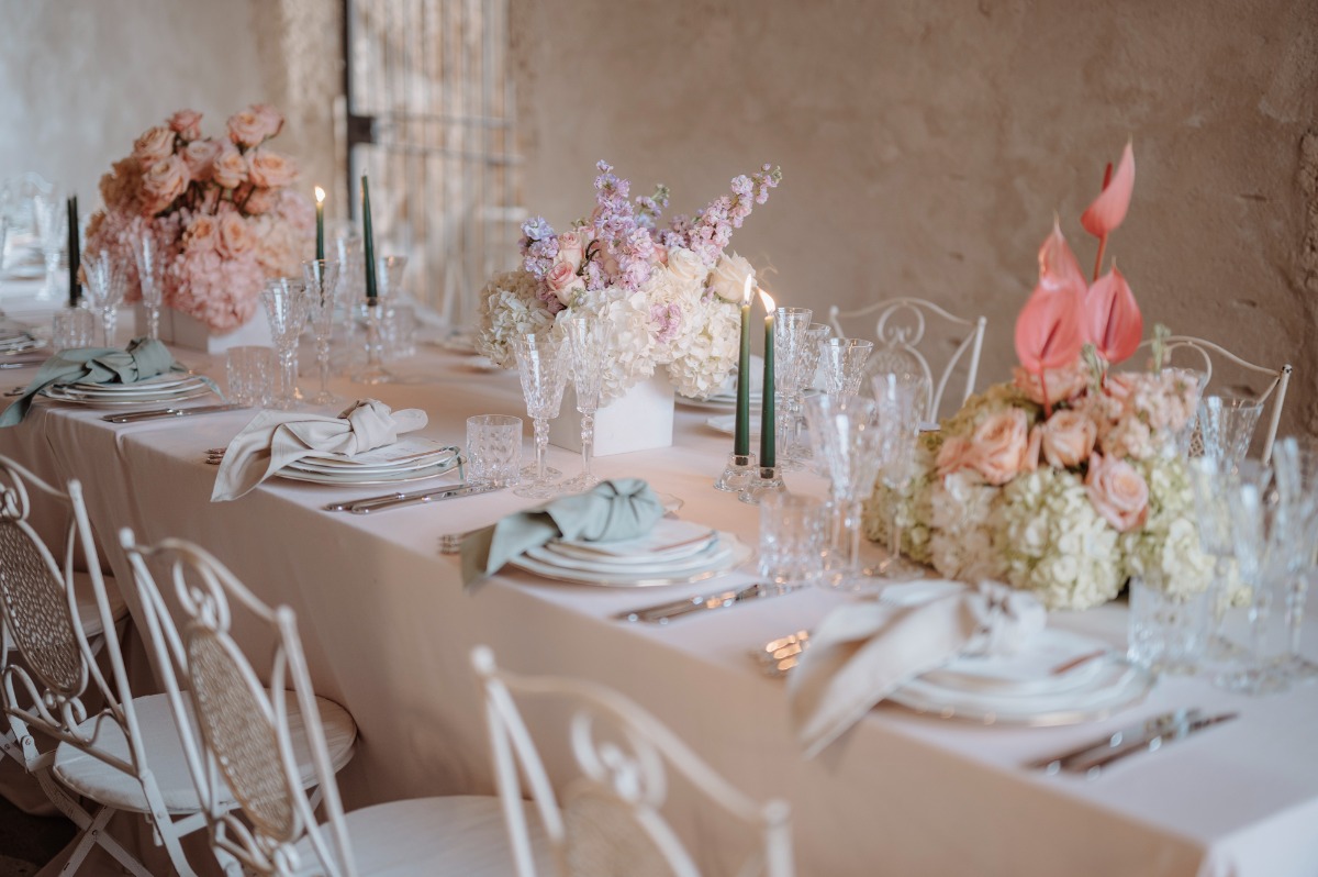 Tablescape with vintage glasses and colorful centerpieces