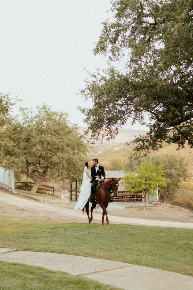 bride and groom on horse