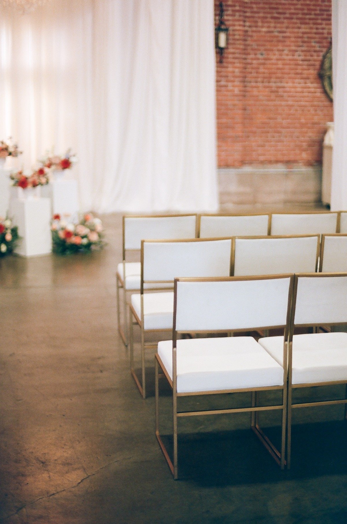 Modern gold and white ceremony chairs