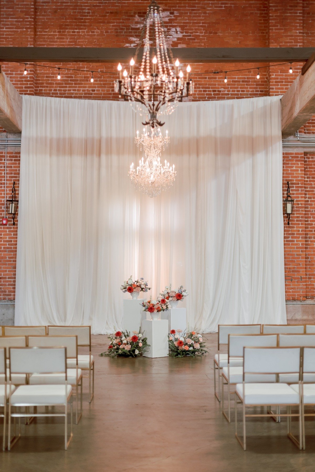 Modern white backdrop wedding ceremony