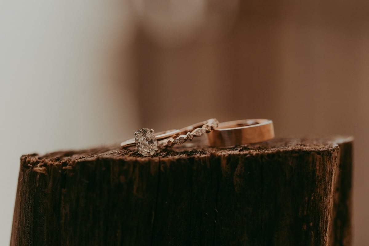 wedding rings on wood