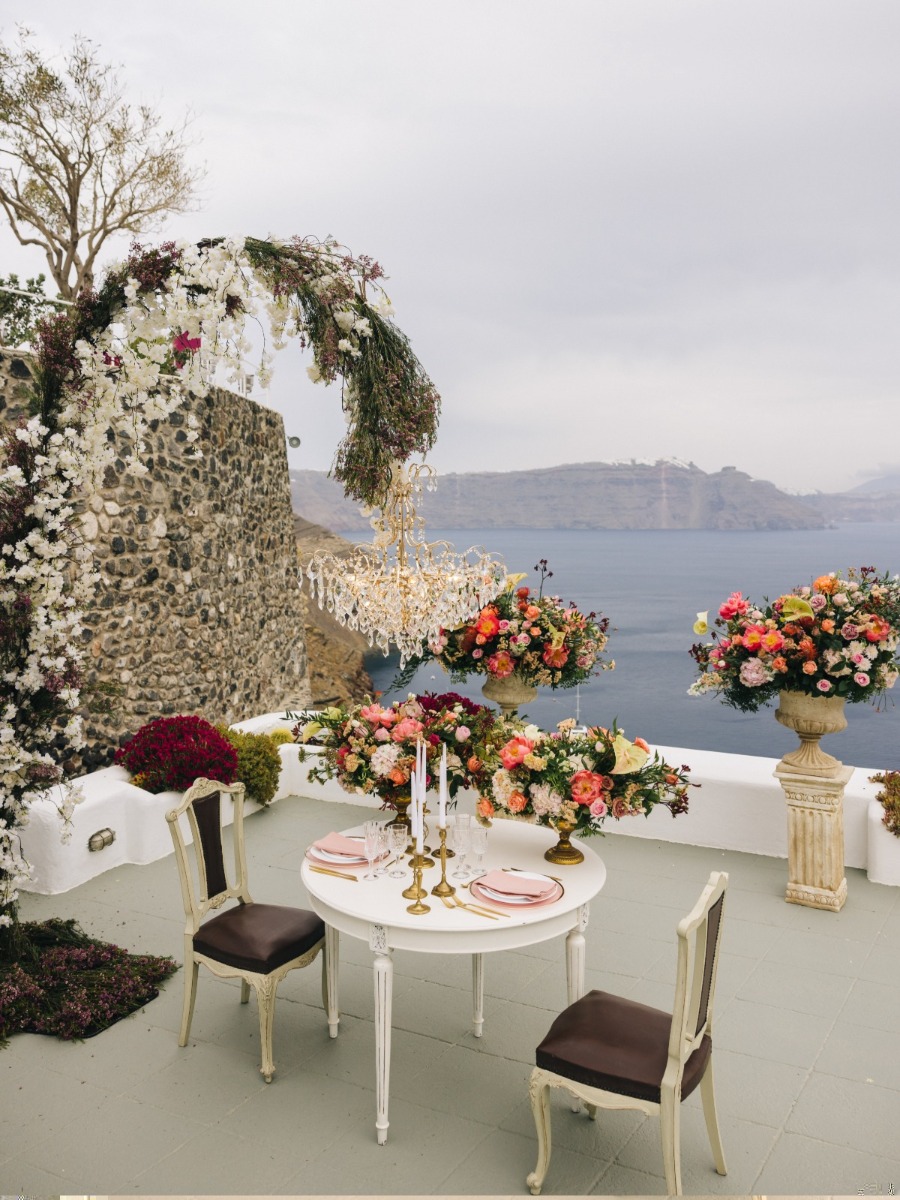 This rooftop Santorini elopement had a glamorous crystal chandelier