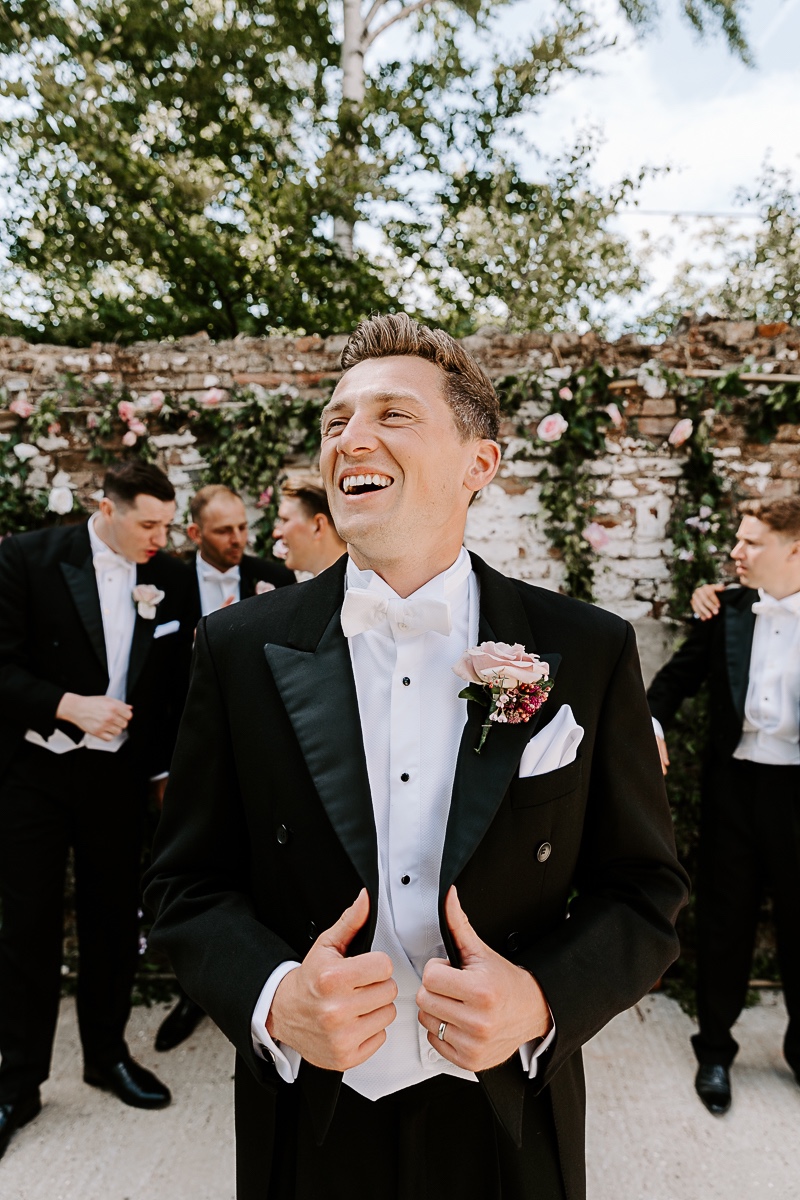 white tie groom and groomsmen