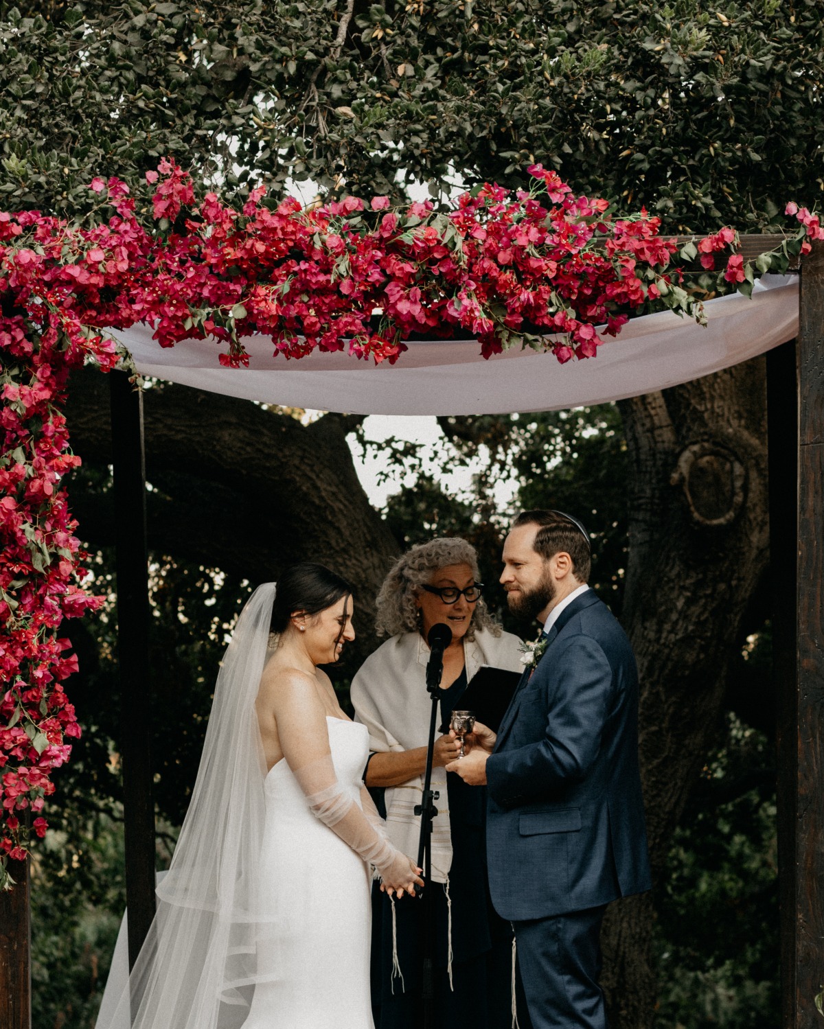 Jewish wedding ceremony under chuppah