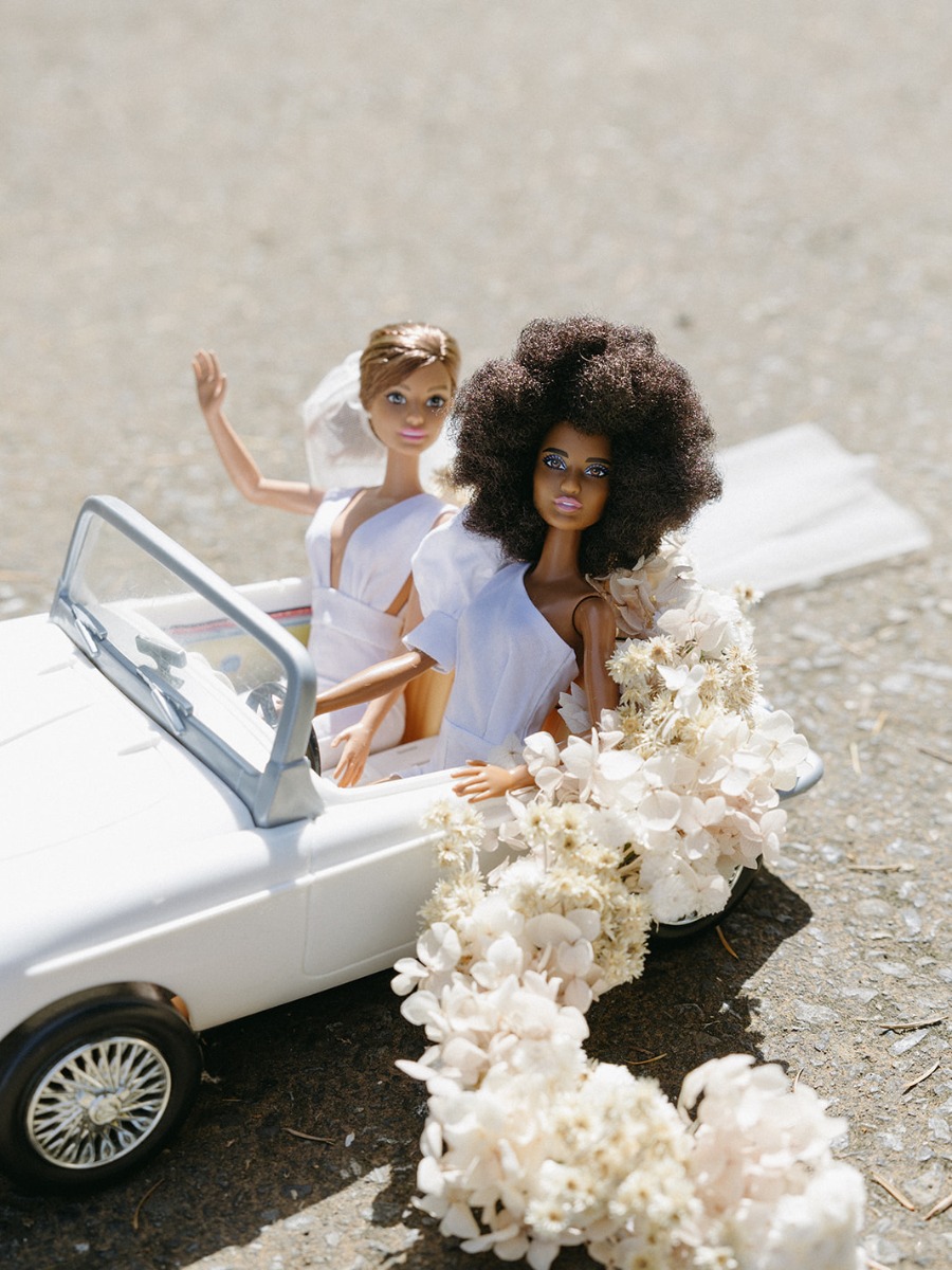 It's a real life Barbie wedding! Two dolls stun in this micro elopement
