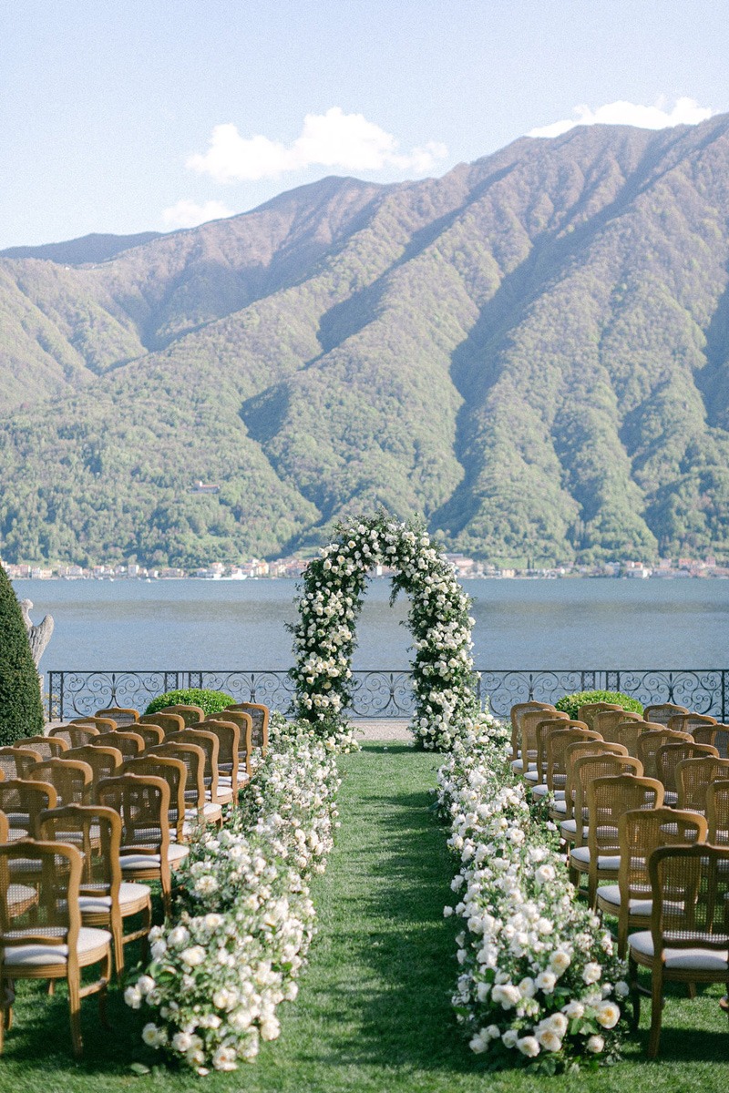 White floral and greenery wedding arch 