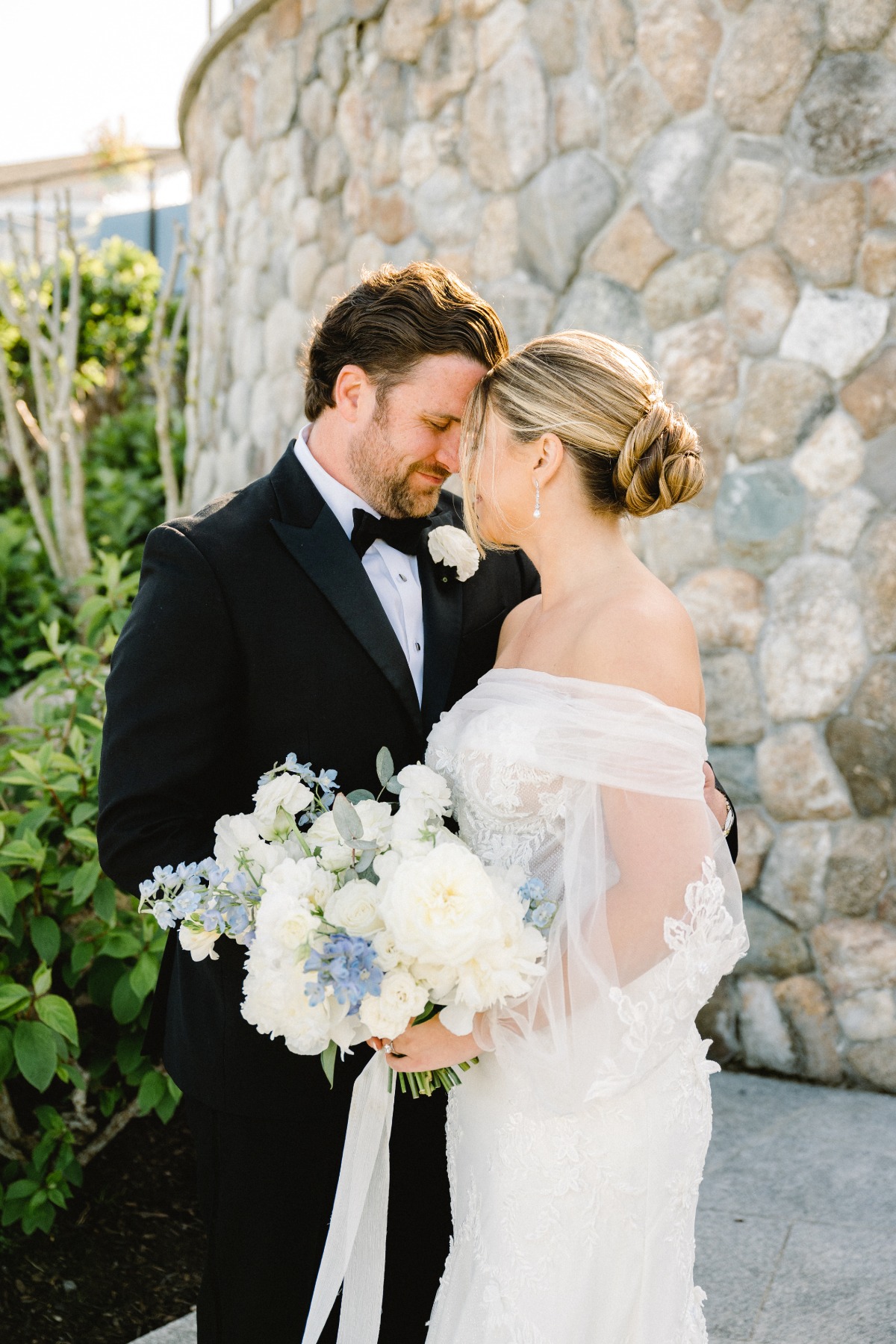 Romantic and timeless Cape Cod bride and groom after ceremony