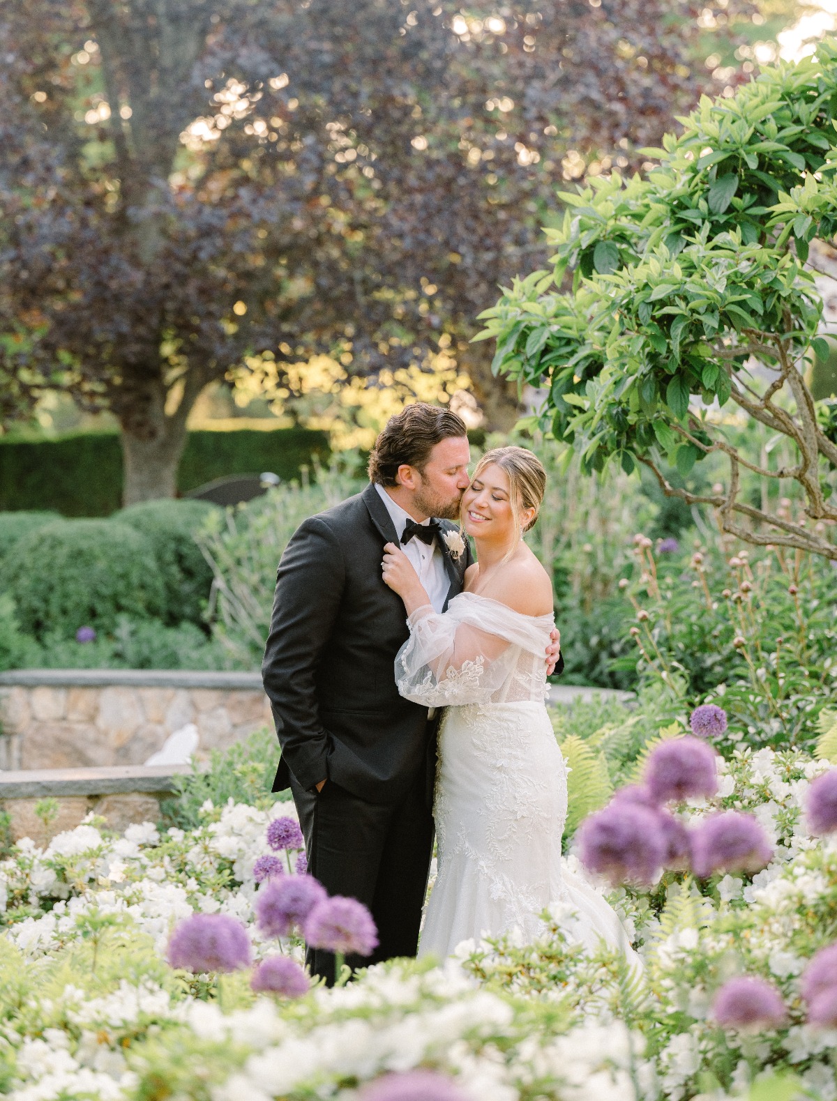 Bride and groom portraits in gardens at Cape Cod wedding