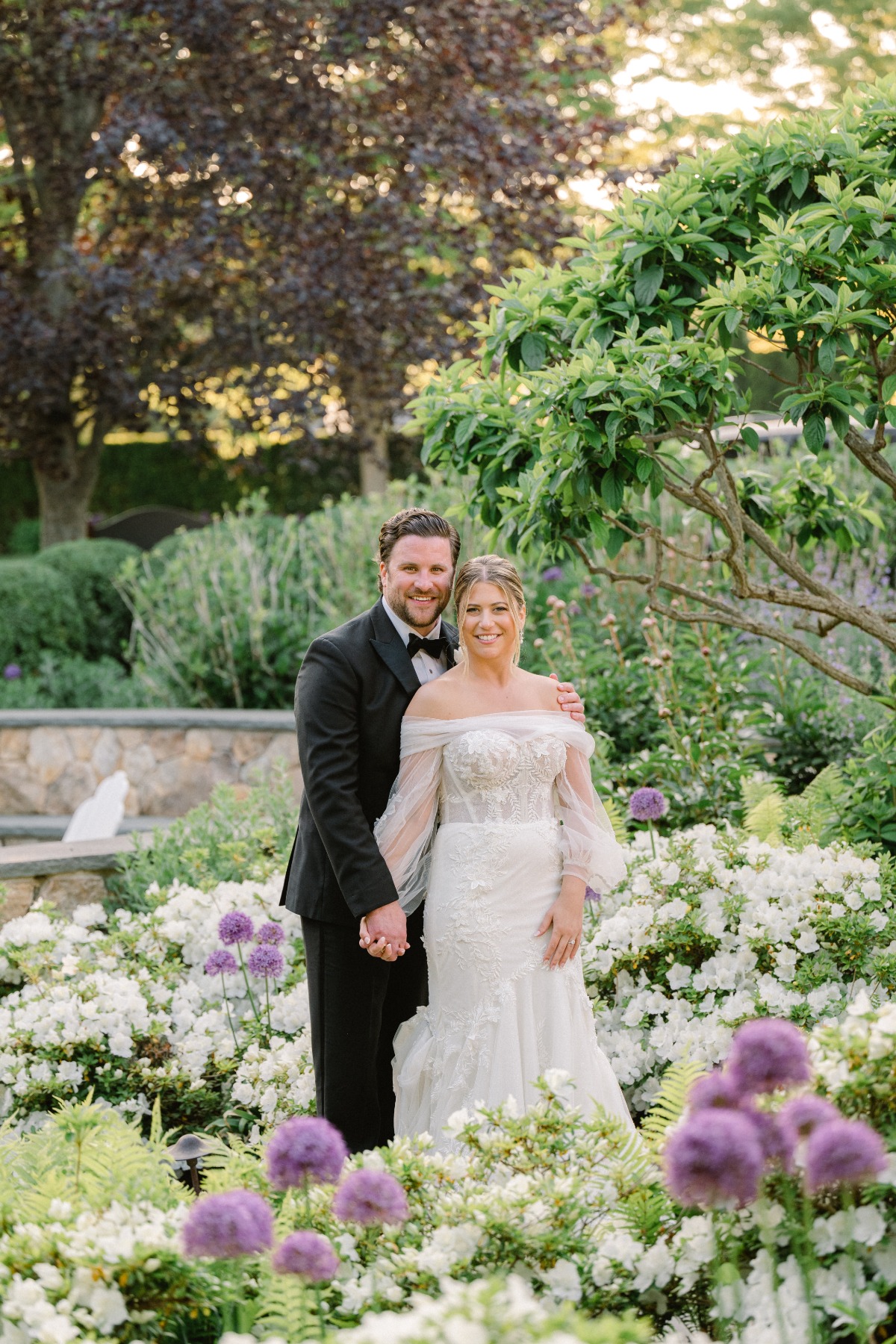 Bride and groom portraits in gardens at Cape Cod venue