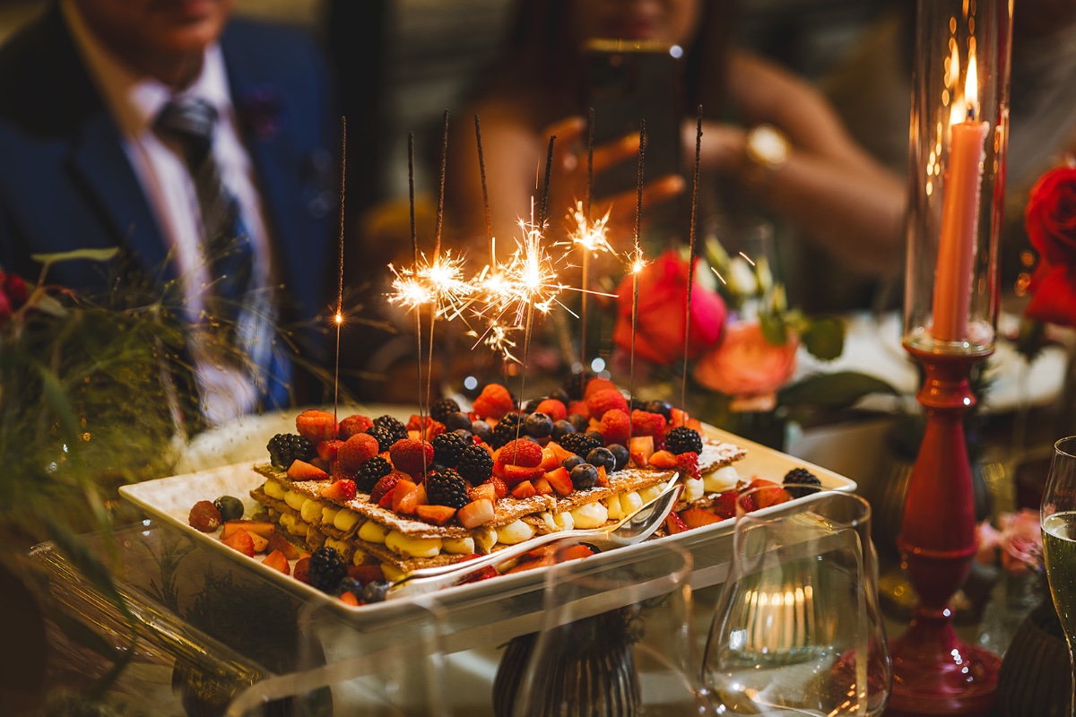 Italian wedding dessert with sparklers