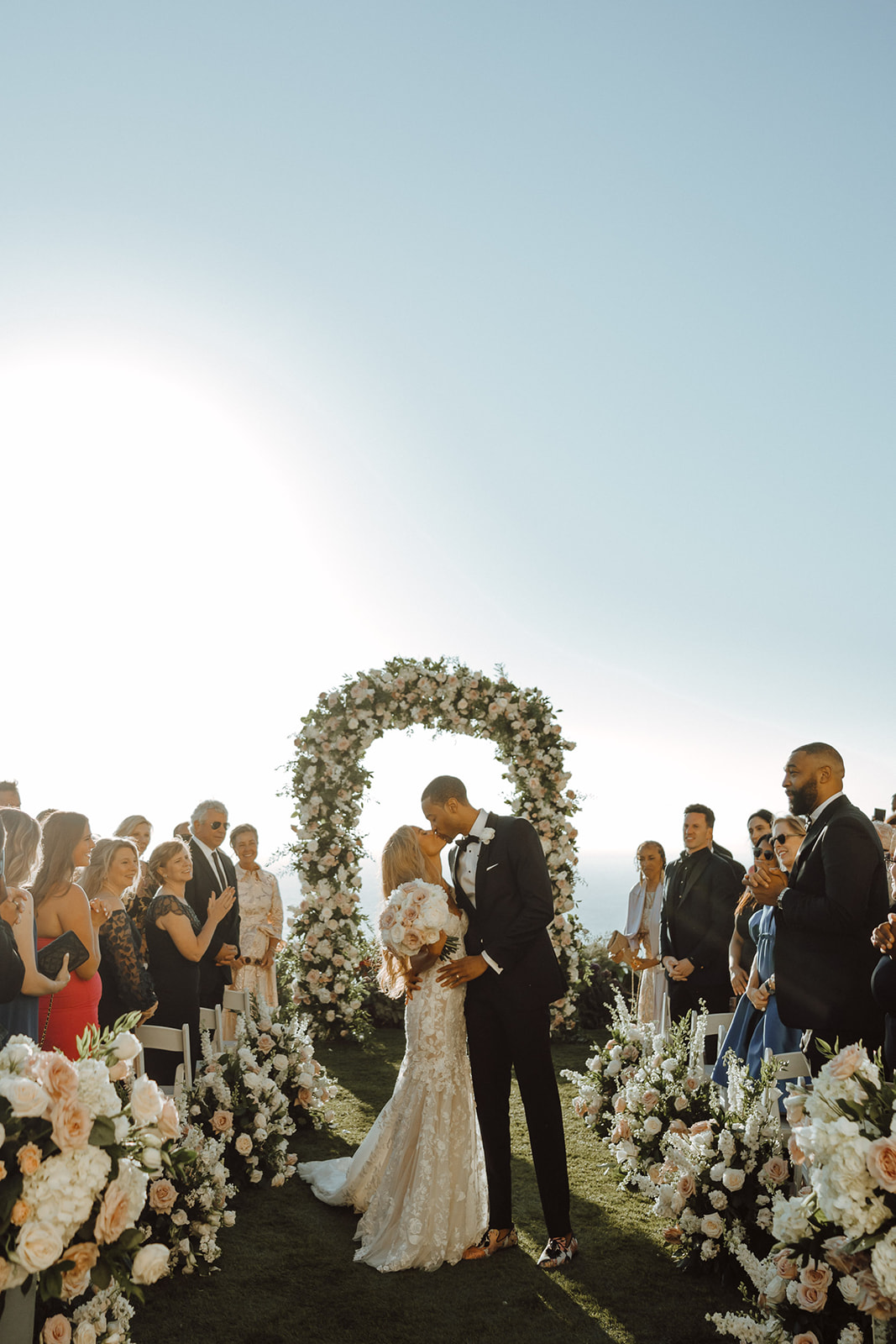 white and blush floral arch