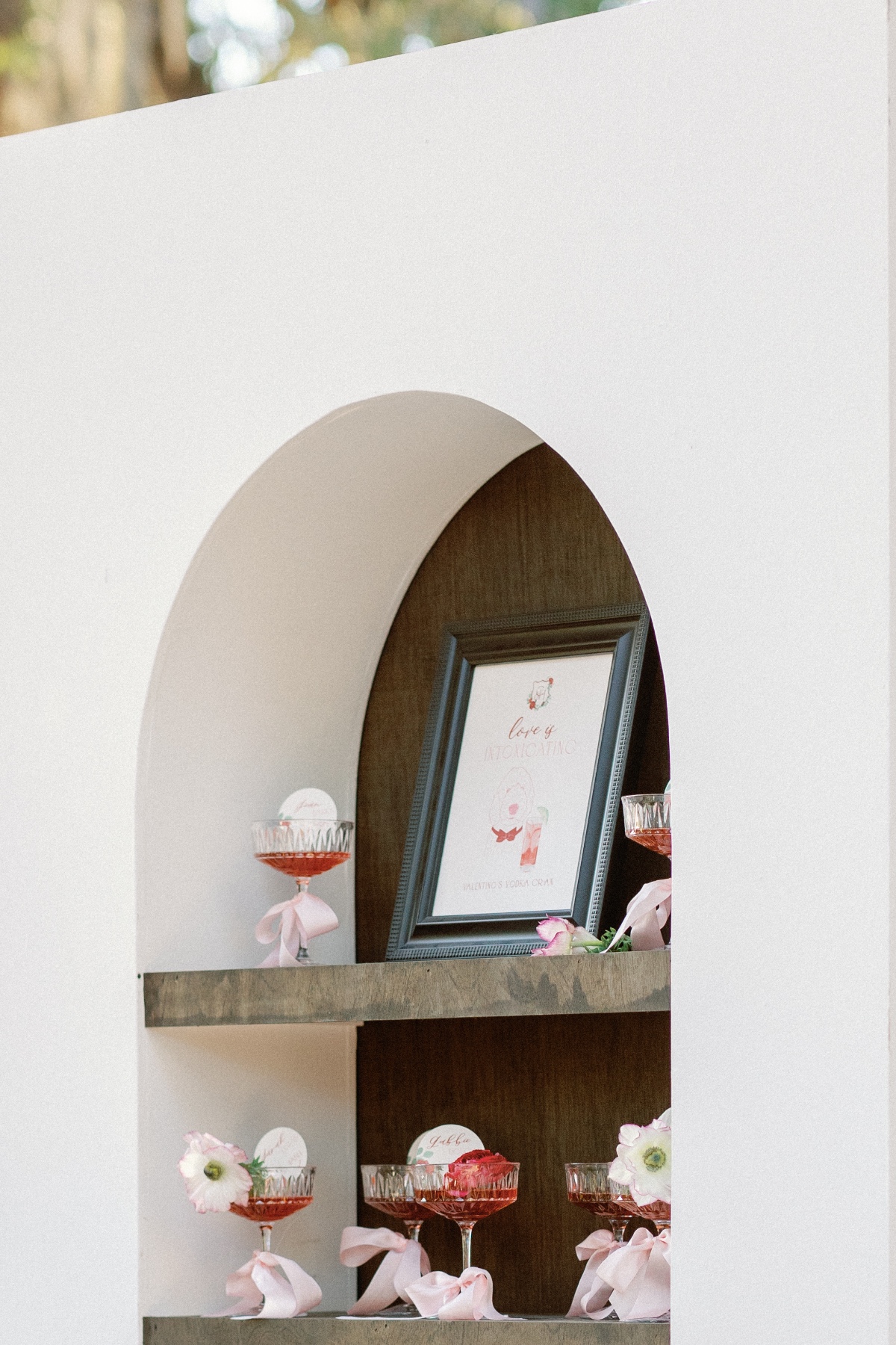 Modern curved cocktail hour drink wall for weddings 