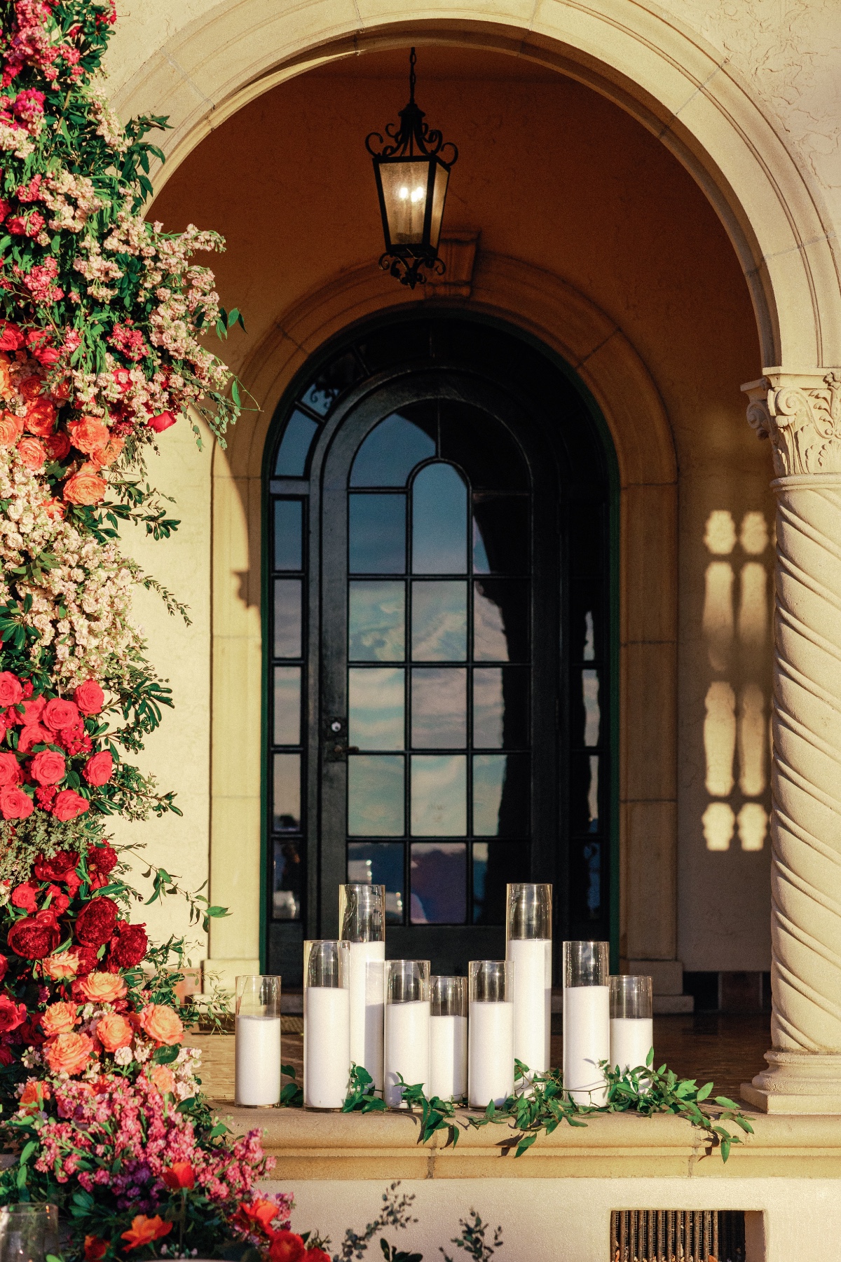 Custom handmade wedding candles in white with glass votives