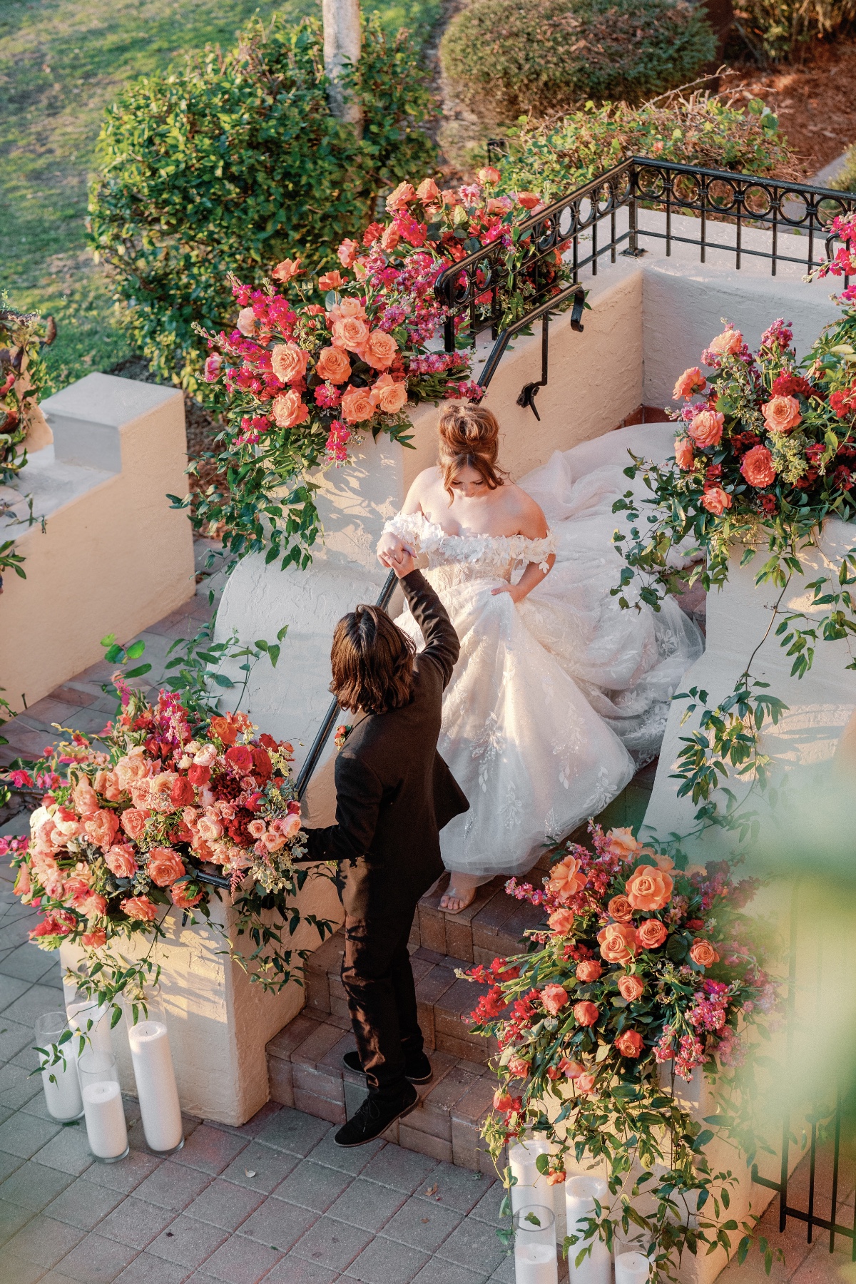 Colorful sunset palette wedding flowers for luxury reception