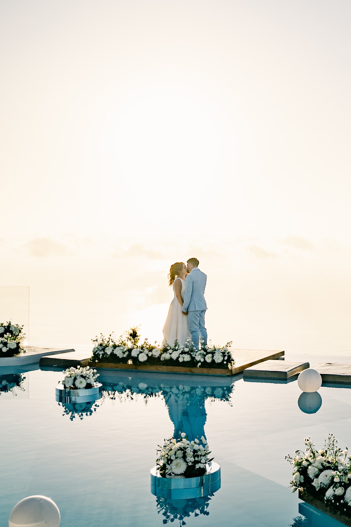 Sunset bride and groom portraits at Greek island wedding 