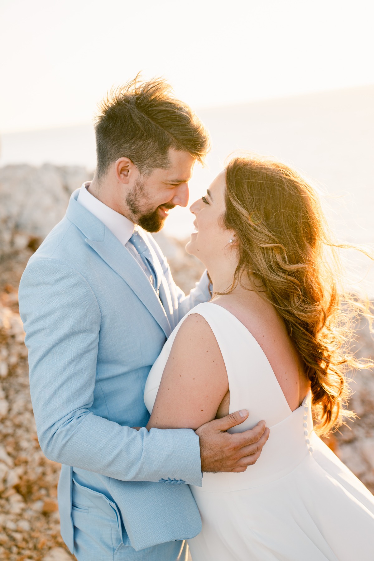 Glowing Canadian bride and groom at Greek island wedding 