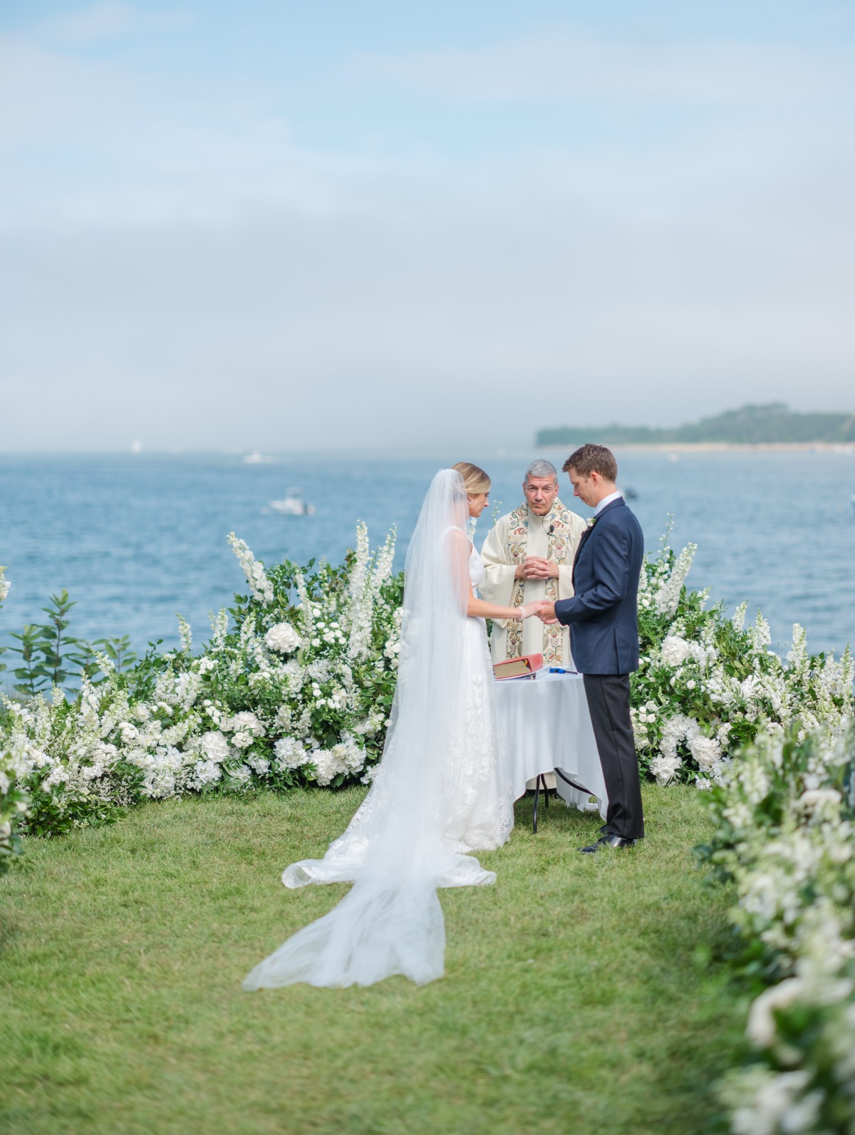 large white flower and greenery ceremony arrangements