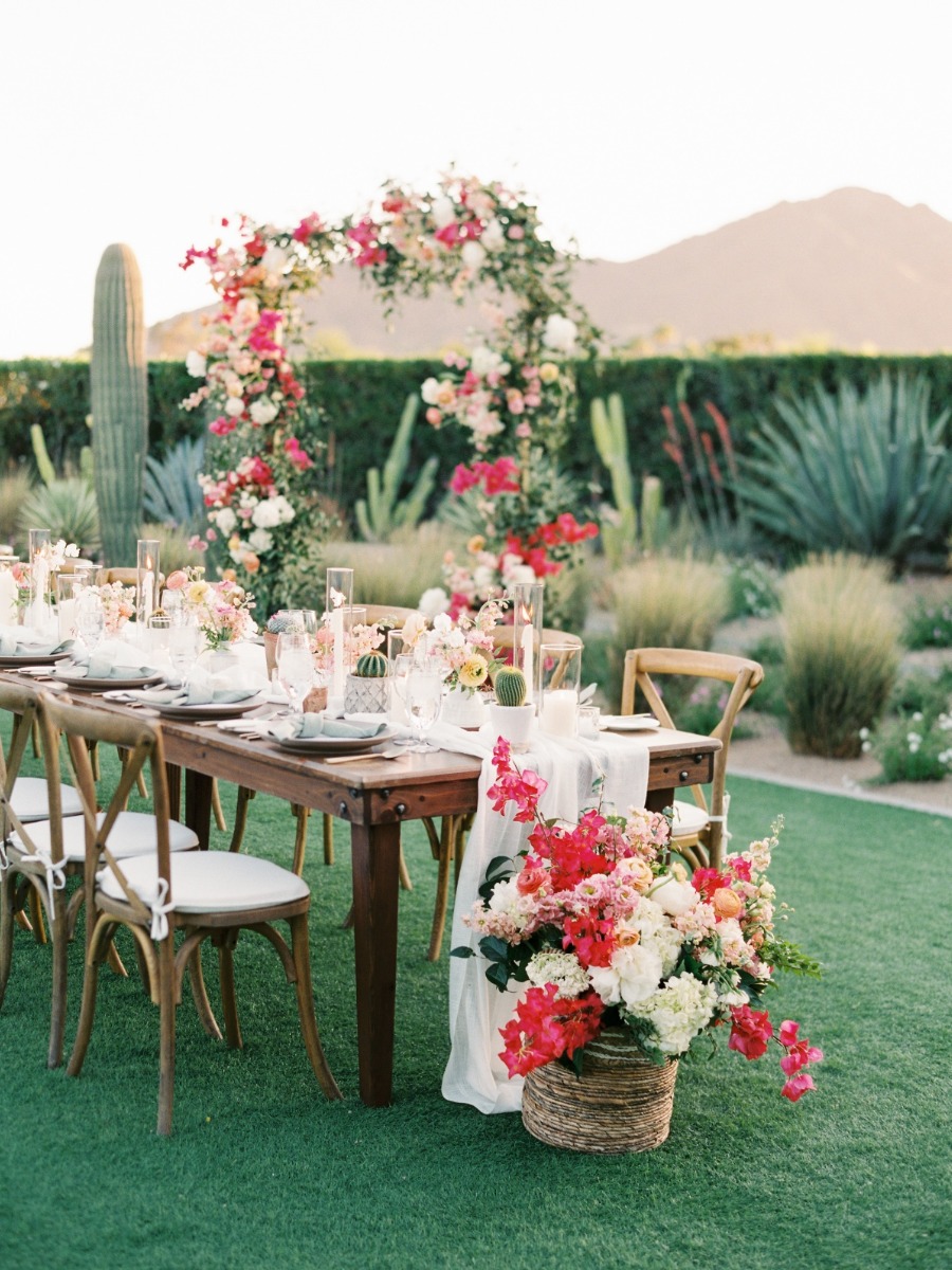 A modern Arizona desert wedding draped in pastel blooms