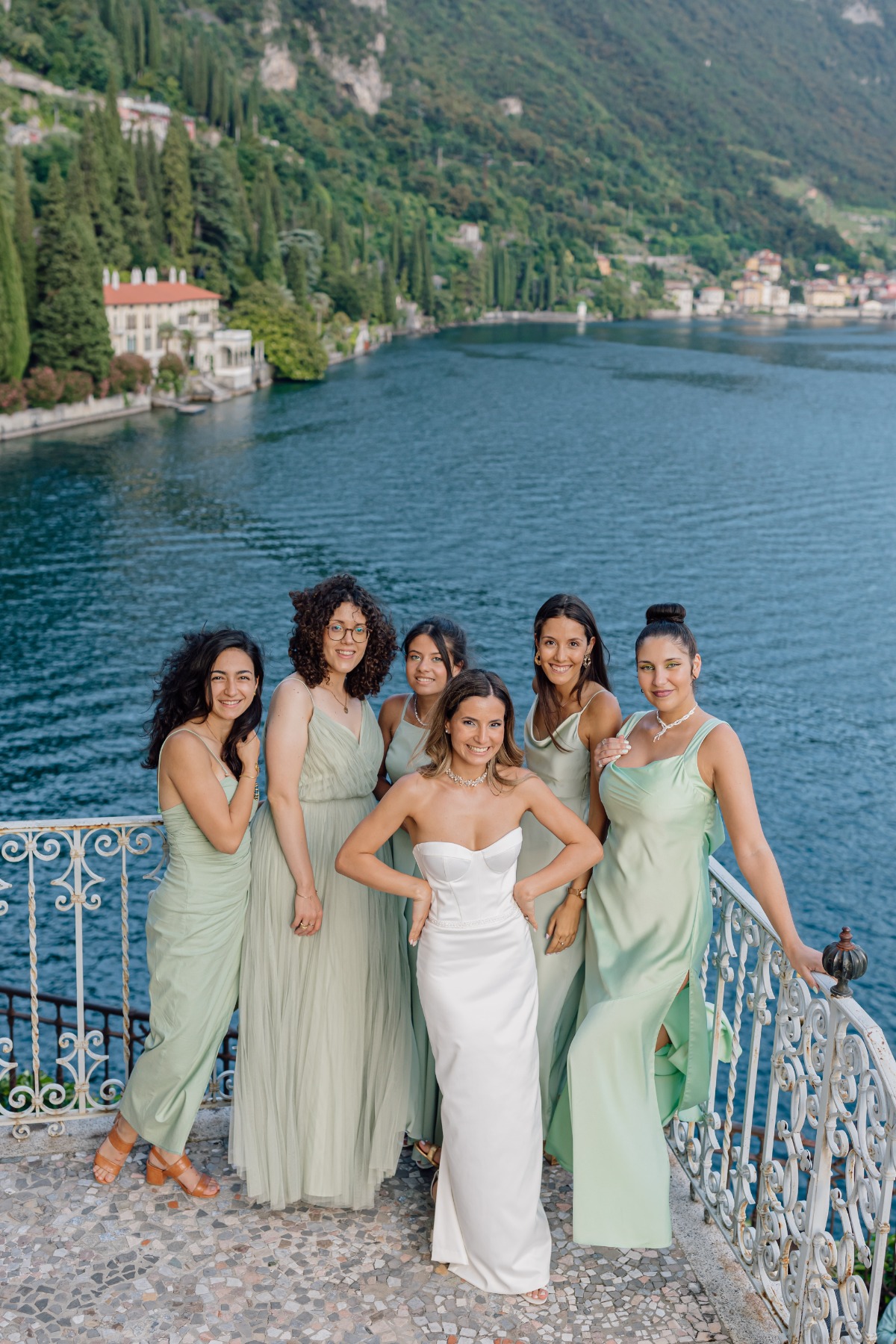 bride with sage bridesmaids