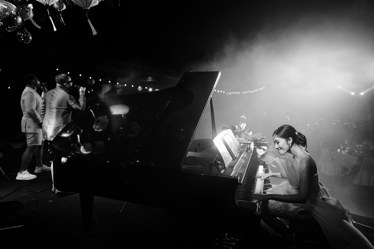 bride is a pianist at music themed wedding