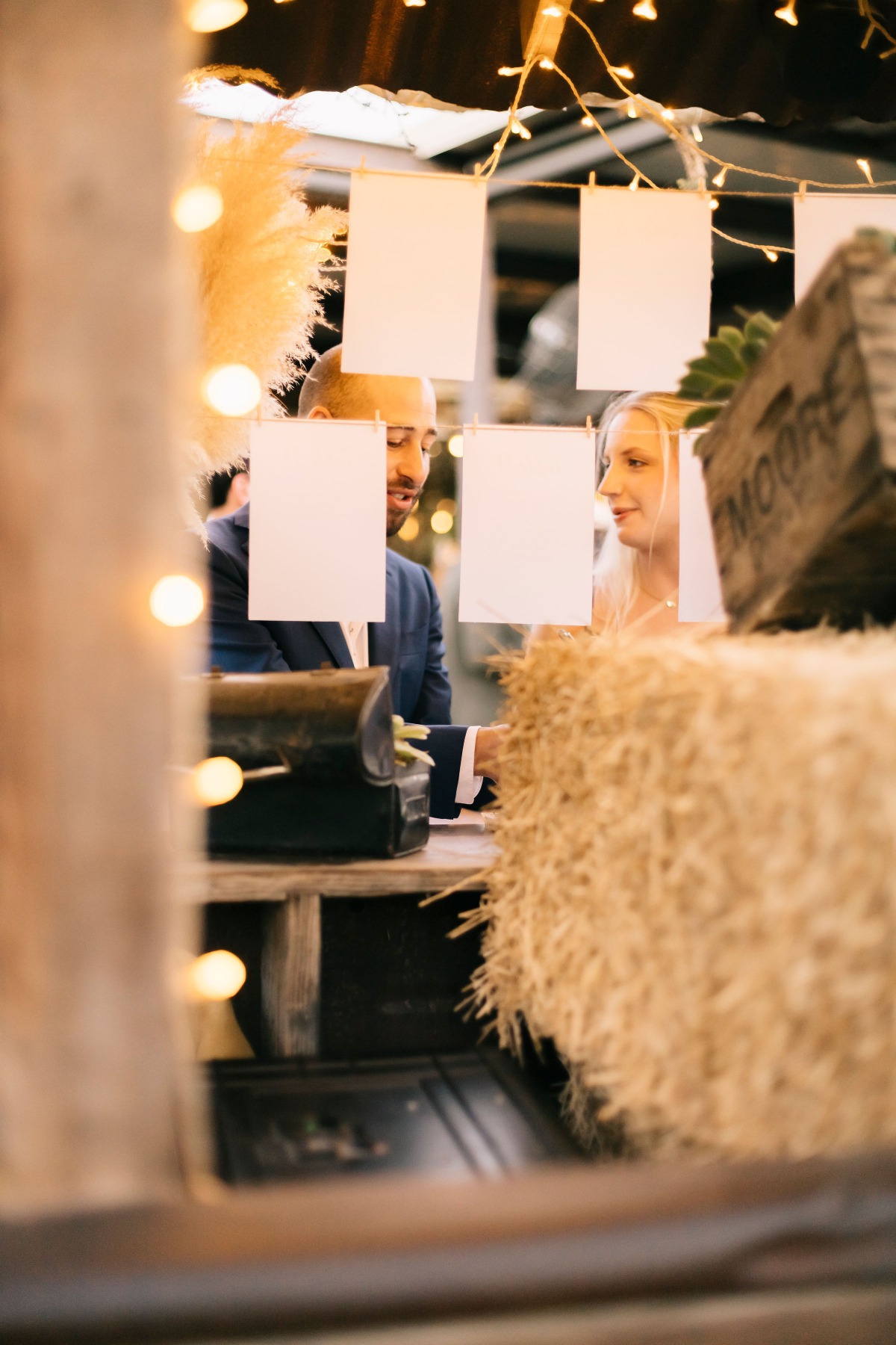 Destination wedding guests using unique guest book 