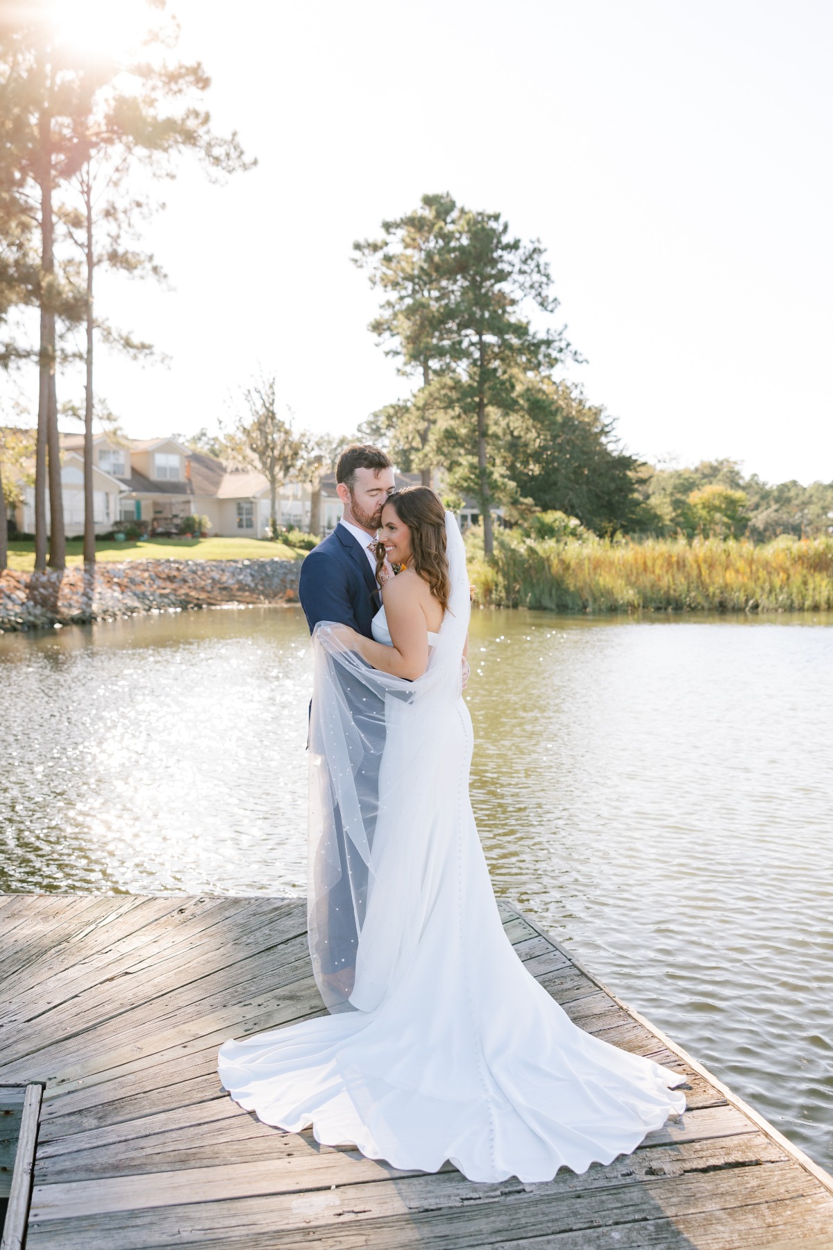 Lakeside wedding portraits after romantic ceremony in Georgia