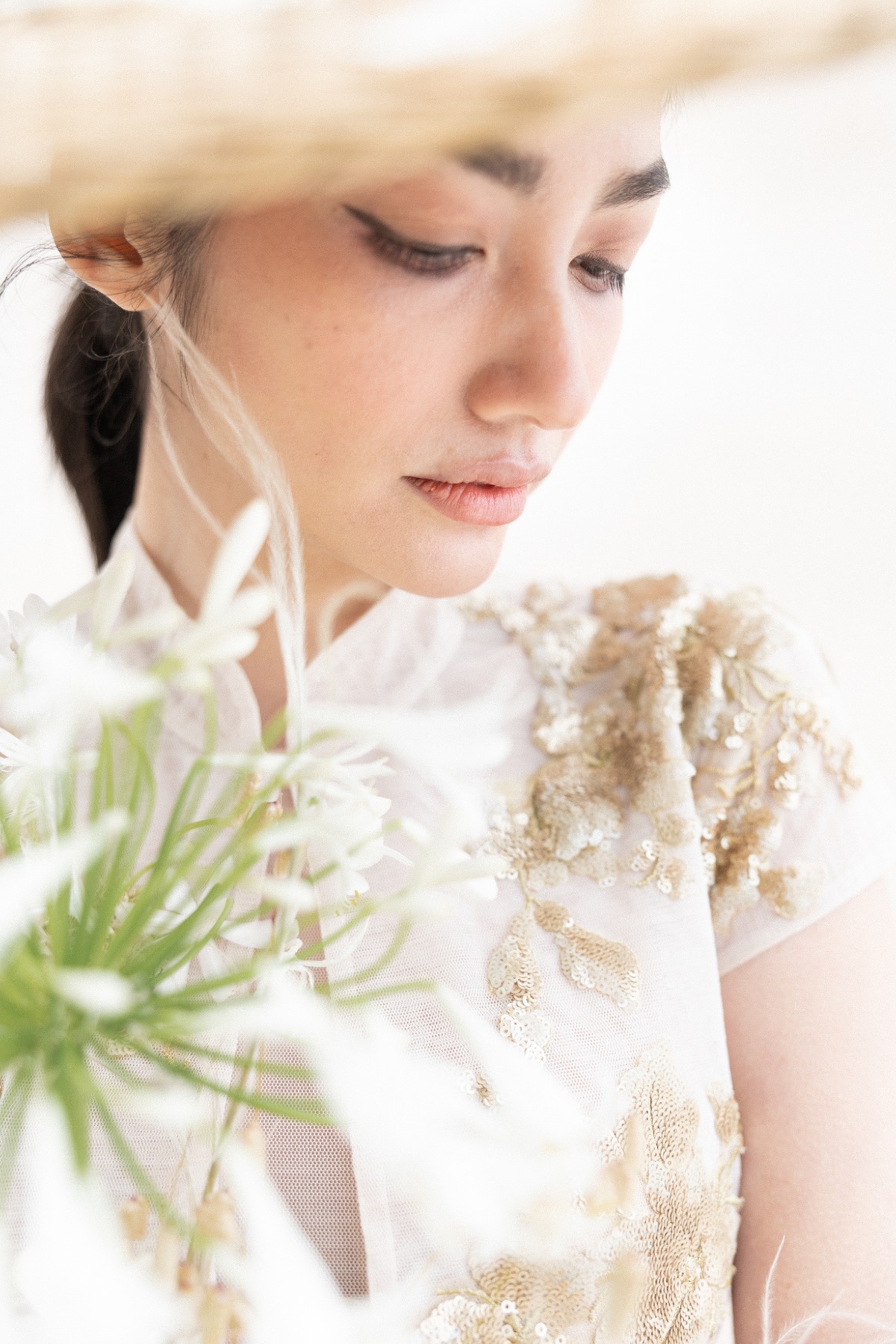 Gold floral sequin details on Chinese wedding dress