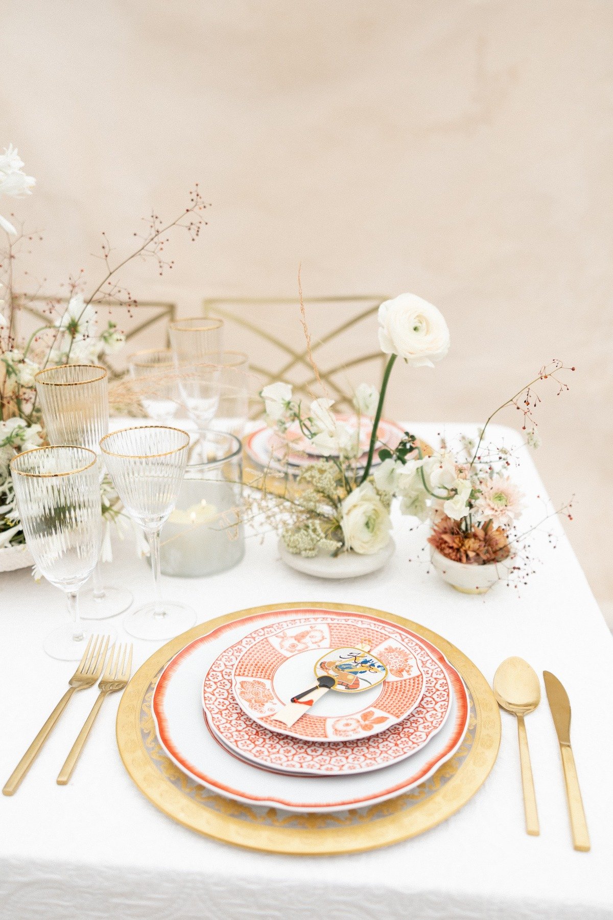 Gold and red East Asian inspired wedding tablescape 