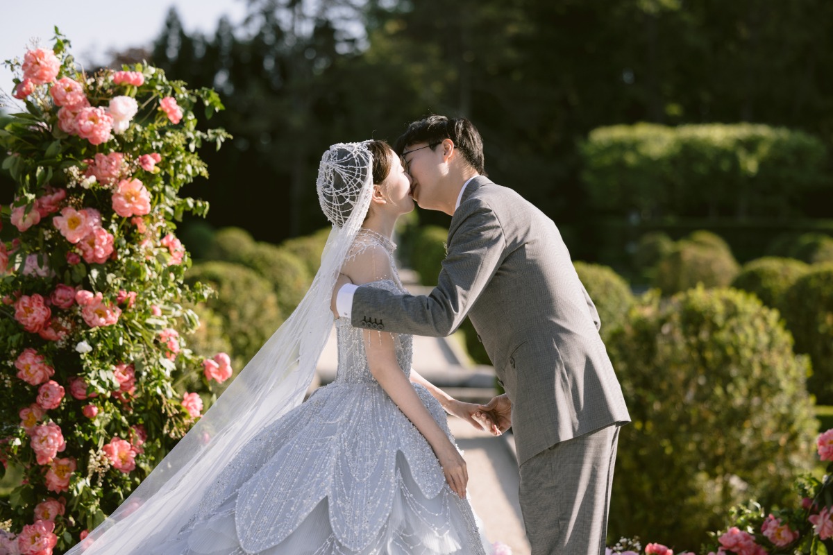 fairytale wedding ceremony bride and groom kiss