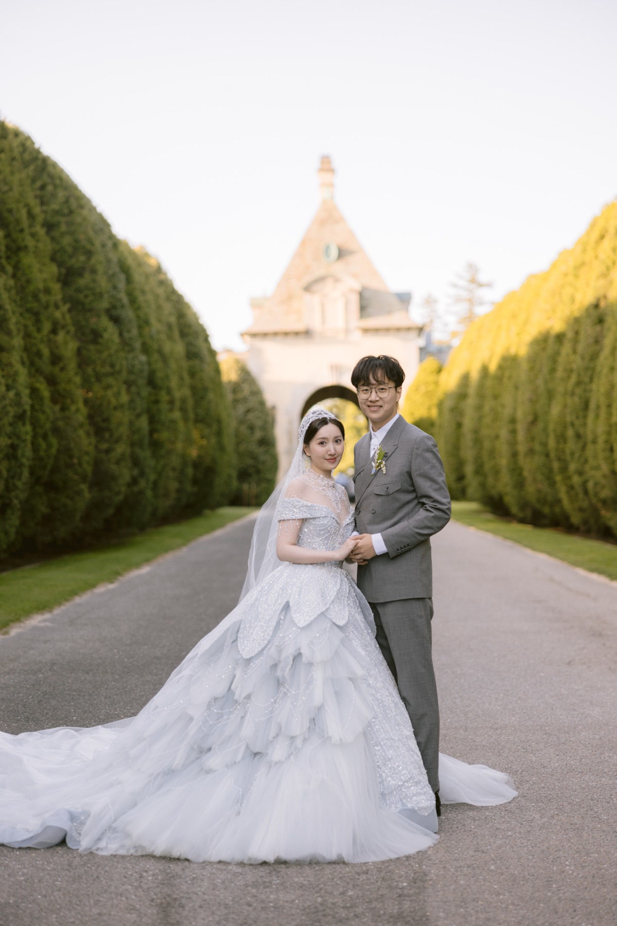 cinderella bride and groom in castle garden