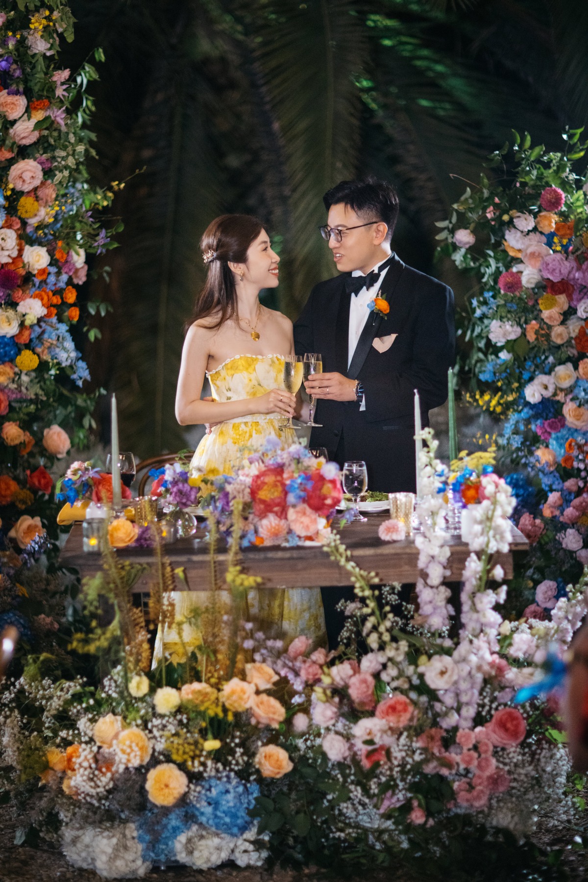 sweetheart table surrounded by florals