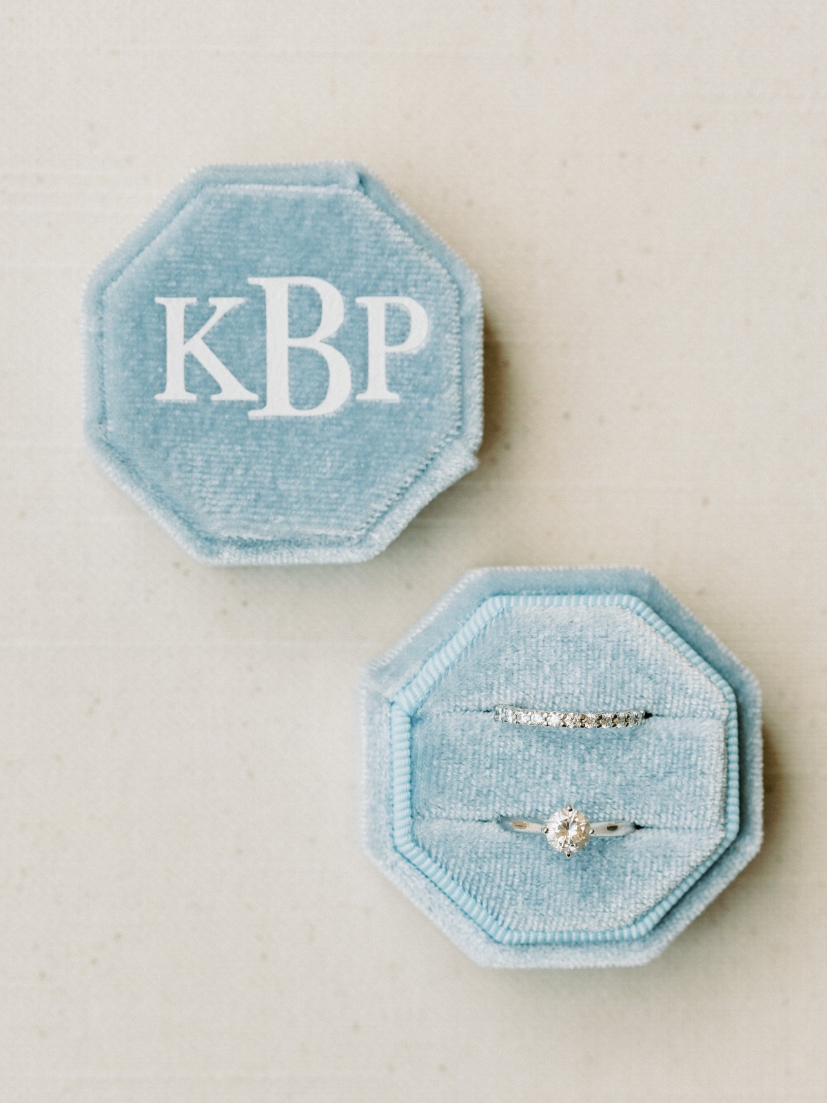 Light blue custom velvet ring box for wedding day photos