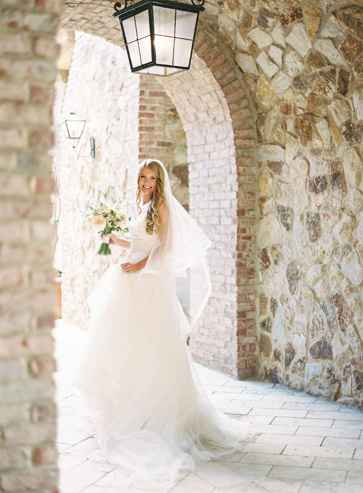 Magnolia Laine wedding gown with layered tulle skirt 