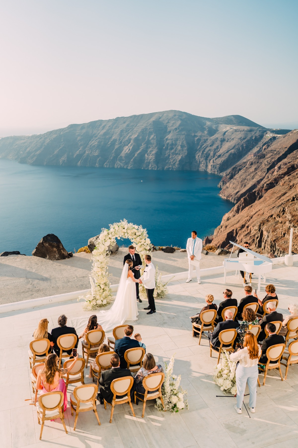 white rose and baby's breath floral arch