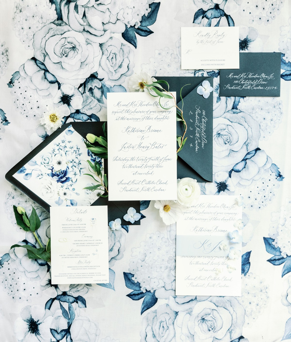 blue and white wedding linens and invitations