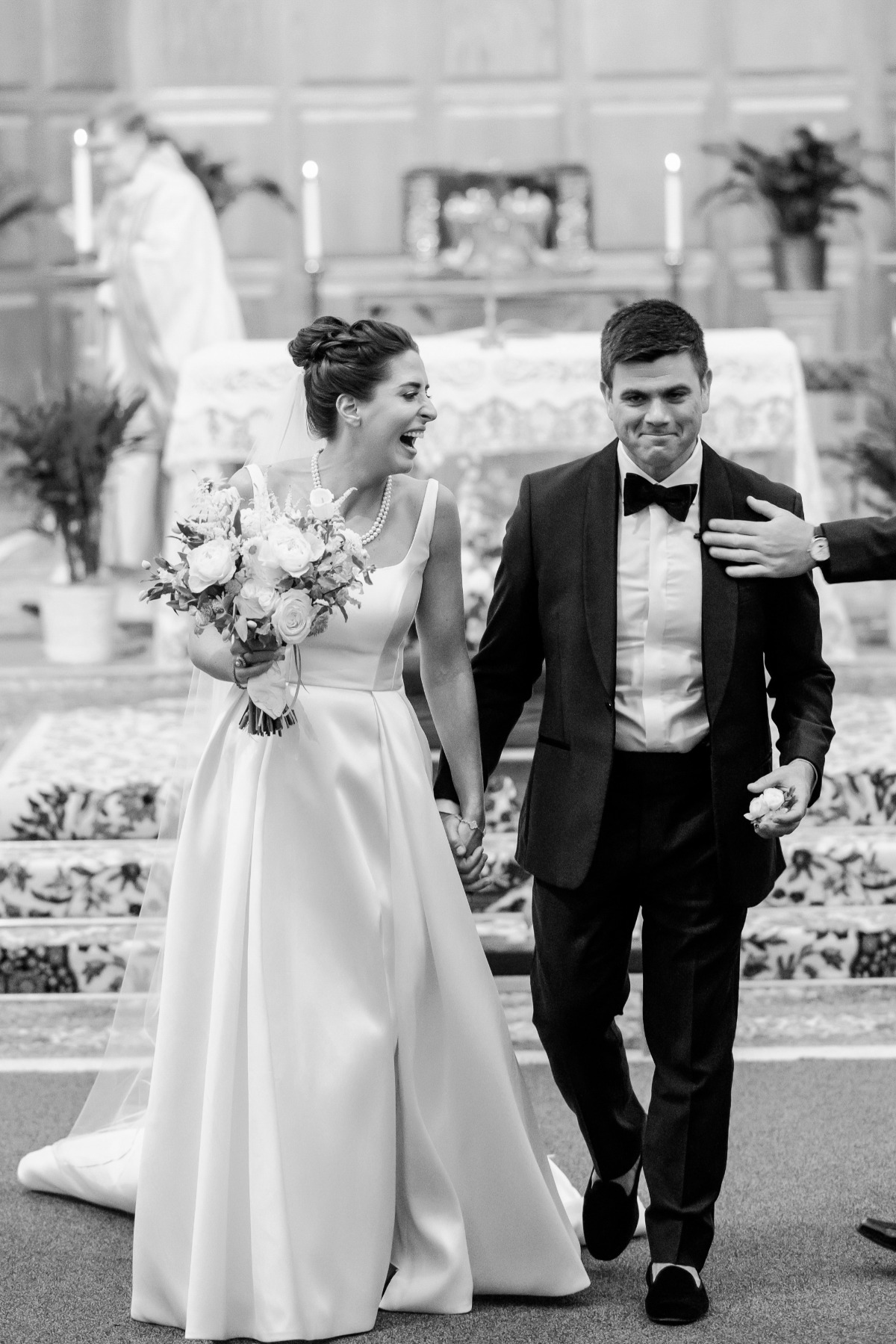 bride and groom leaving church wedding