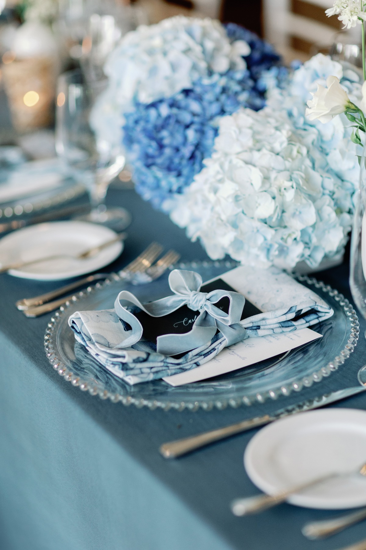 blue velvet ribbon bow detail at wedding reception