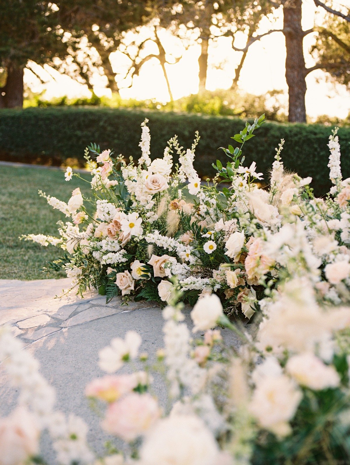 large pastel floor floral arrangements for wedding ceremony